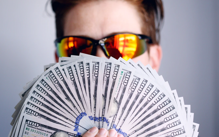 man holding money